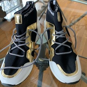 Michael Kors designer sneakers. White black and gold design . Size 8 1/2